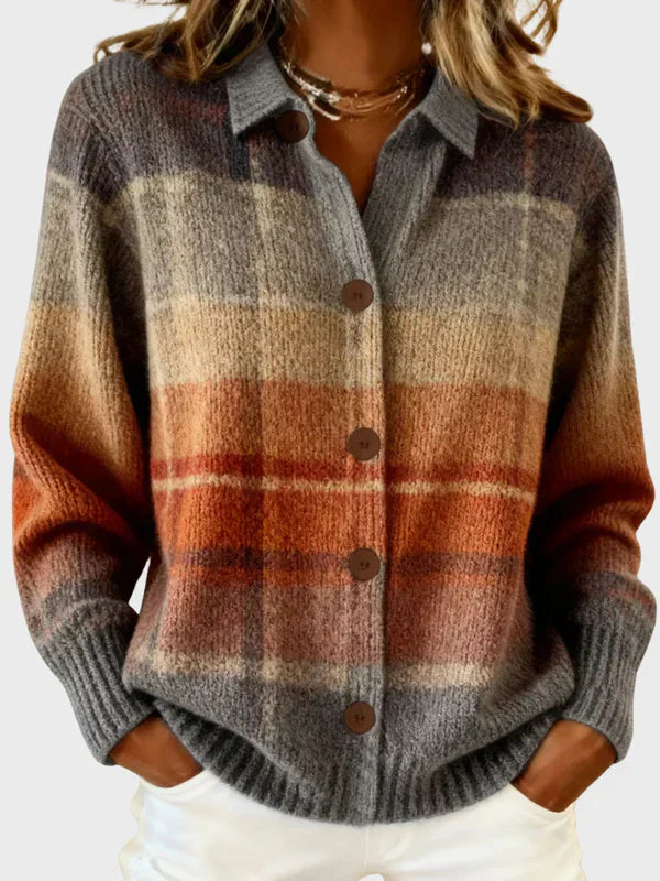 Cozy plaid knit cardigan with button front in earthy gray, beige, and burnt orange tones.
