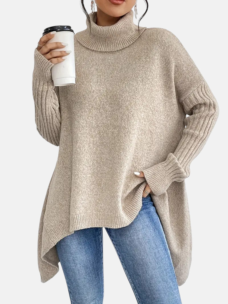 Camel wool blend long turtleneck sweater with ribbed sleeves and relaxed fit.