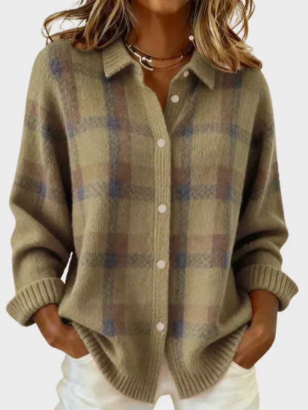 Plaid knit cardigan in muted green and brown tones with button front and ribbed cuffs.