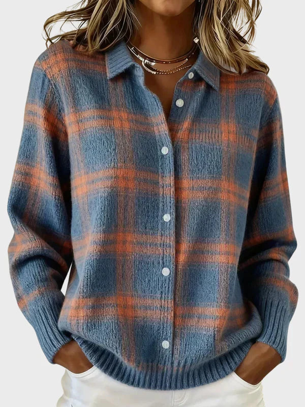 Blue and burnt orange plaid knit cardigan with button front and ribbed cuffs and hem.