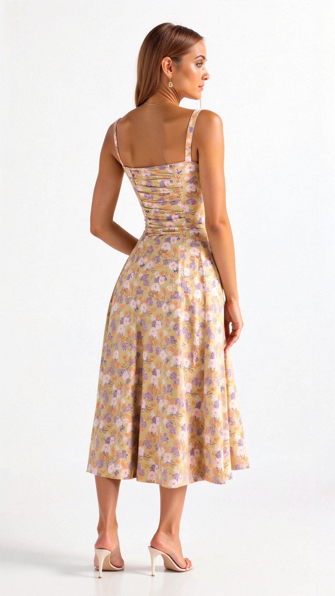 Woman wearing a floral dress on a white background