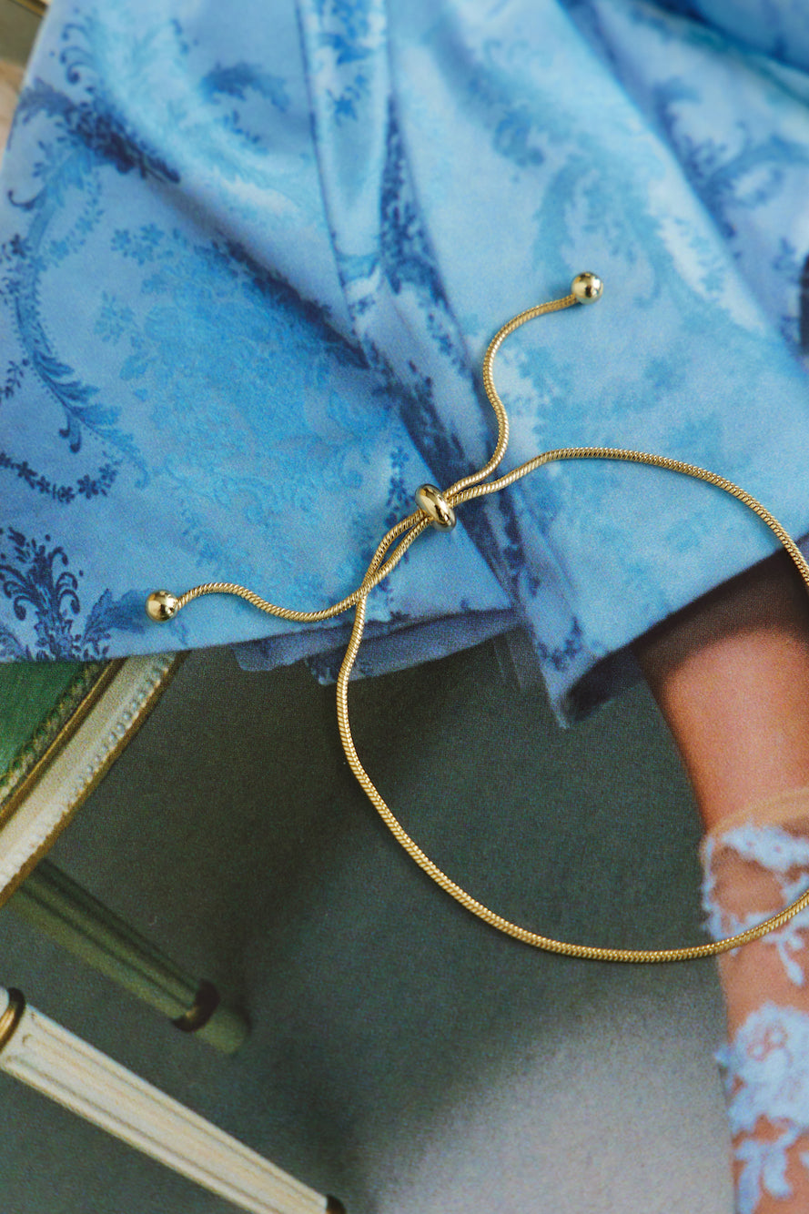 Women's adjustable gold chain bracelet — alternate angle