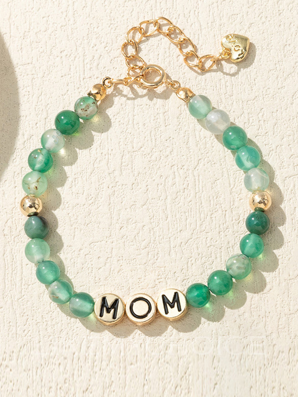 Women's green agate beaded heart charm bracelet — gift box detail