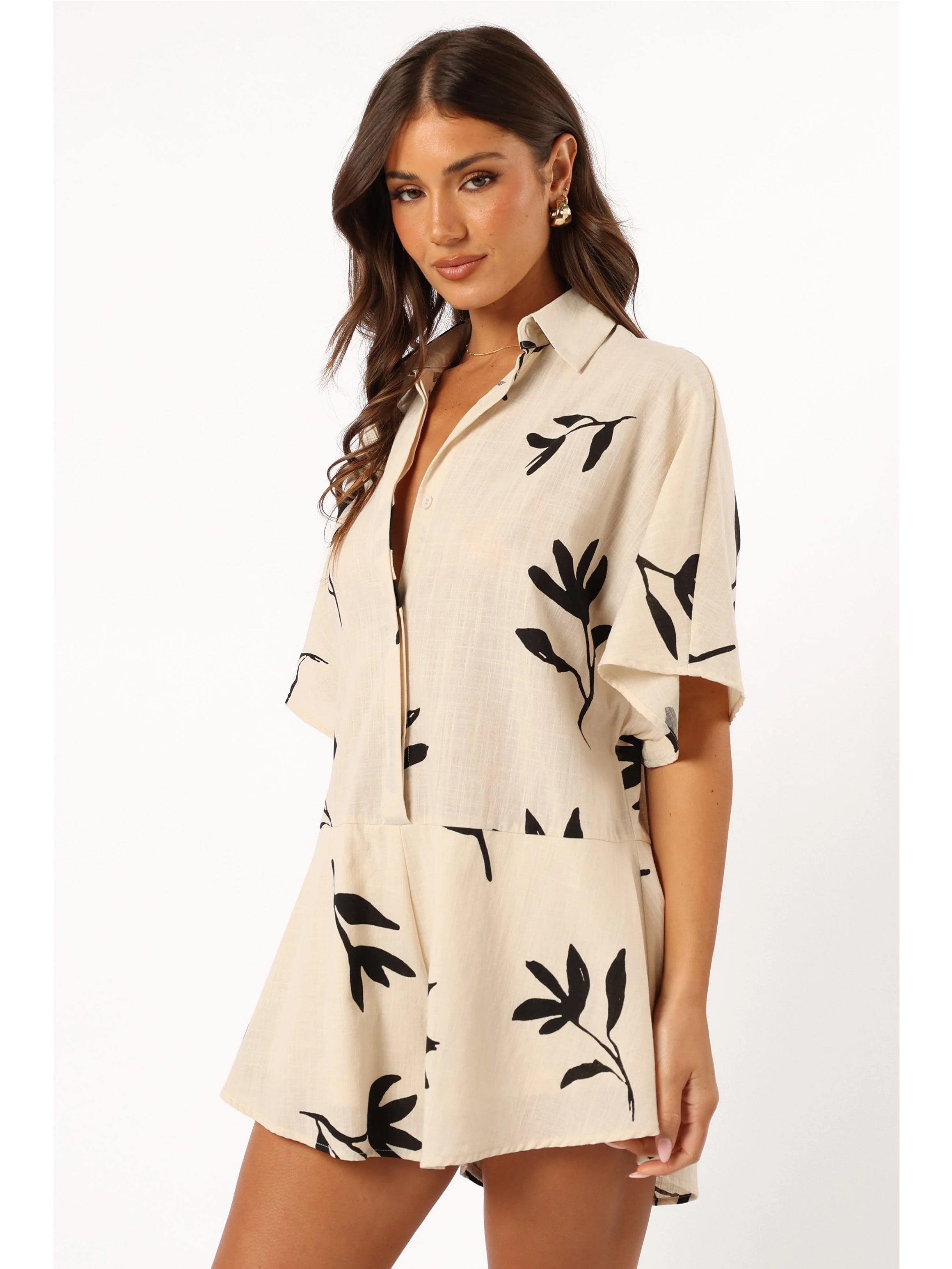 Women's beige leaf print button-down romper — side detail
