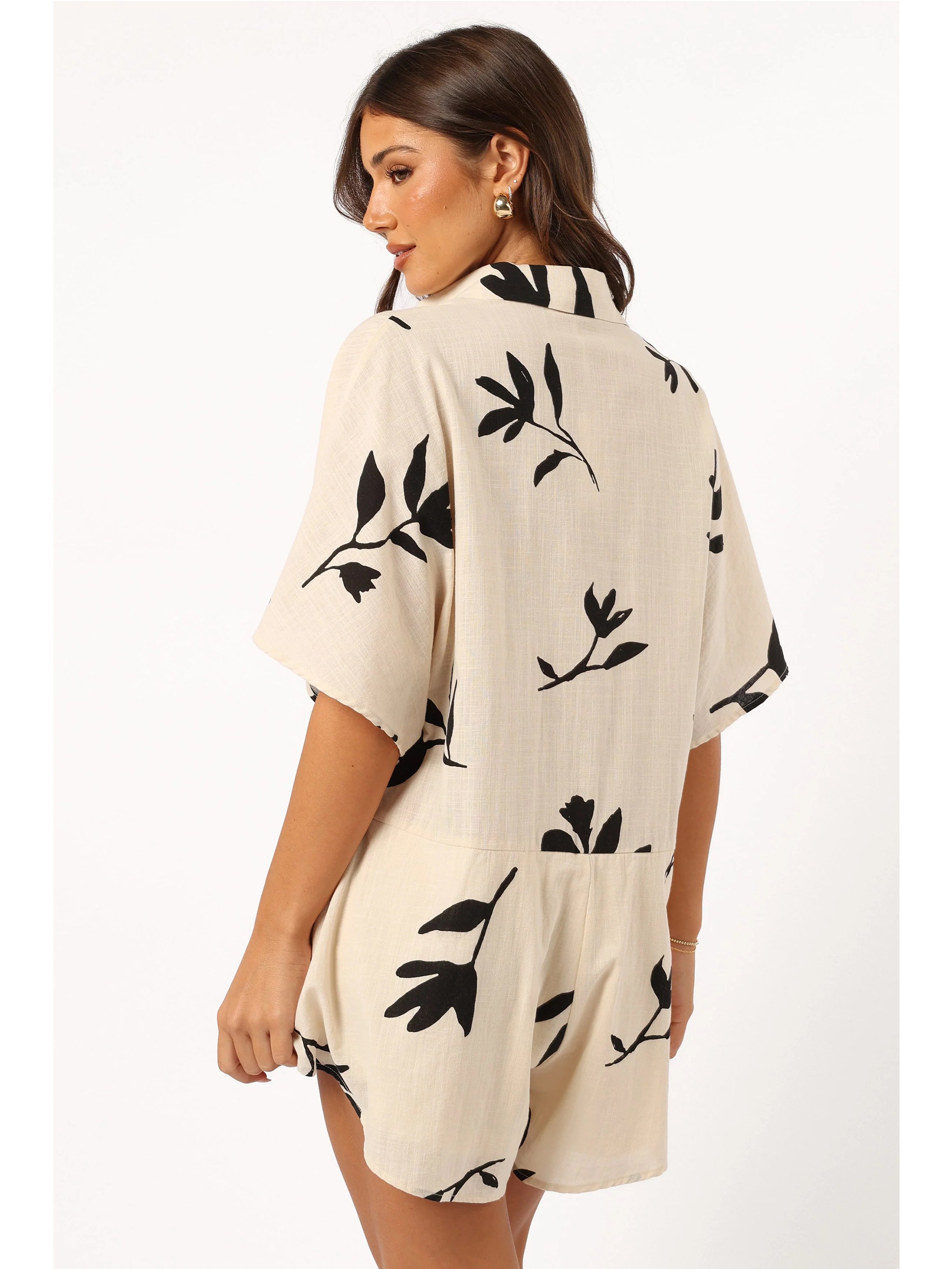 Women's beige leaf print button-down romper — collar detail
