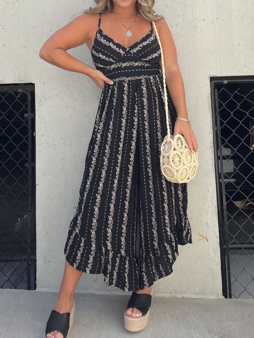 Women's black halter V-neck wide-leg jumpsuit