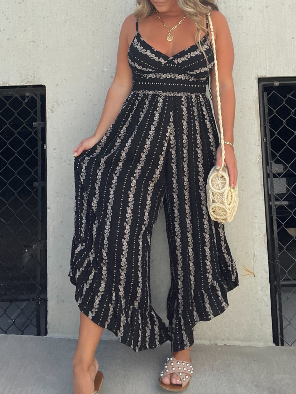 Women's black halter V-neck wide-leg jumpsuit — front view