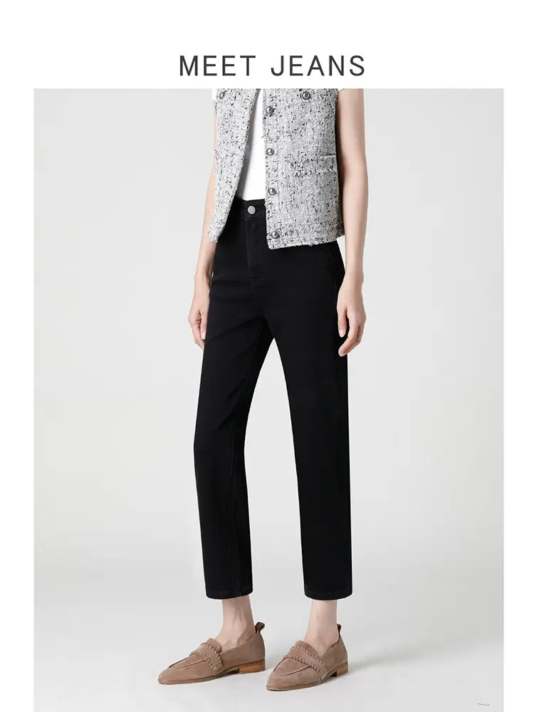 Women's black high-waist cigarette jeans, front view