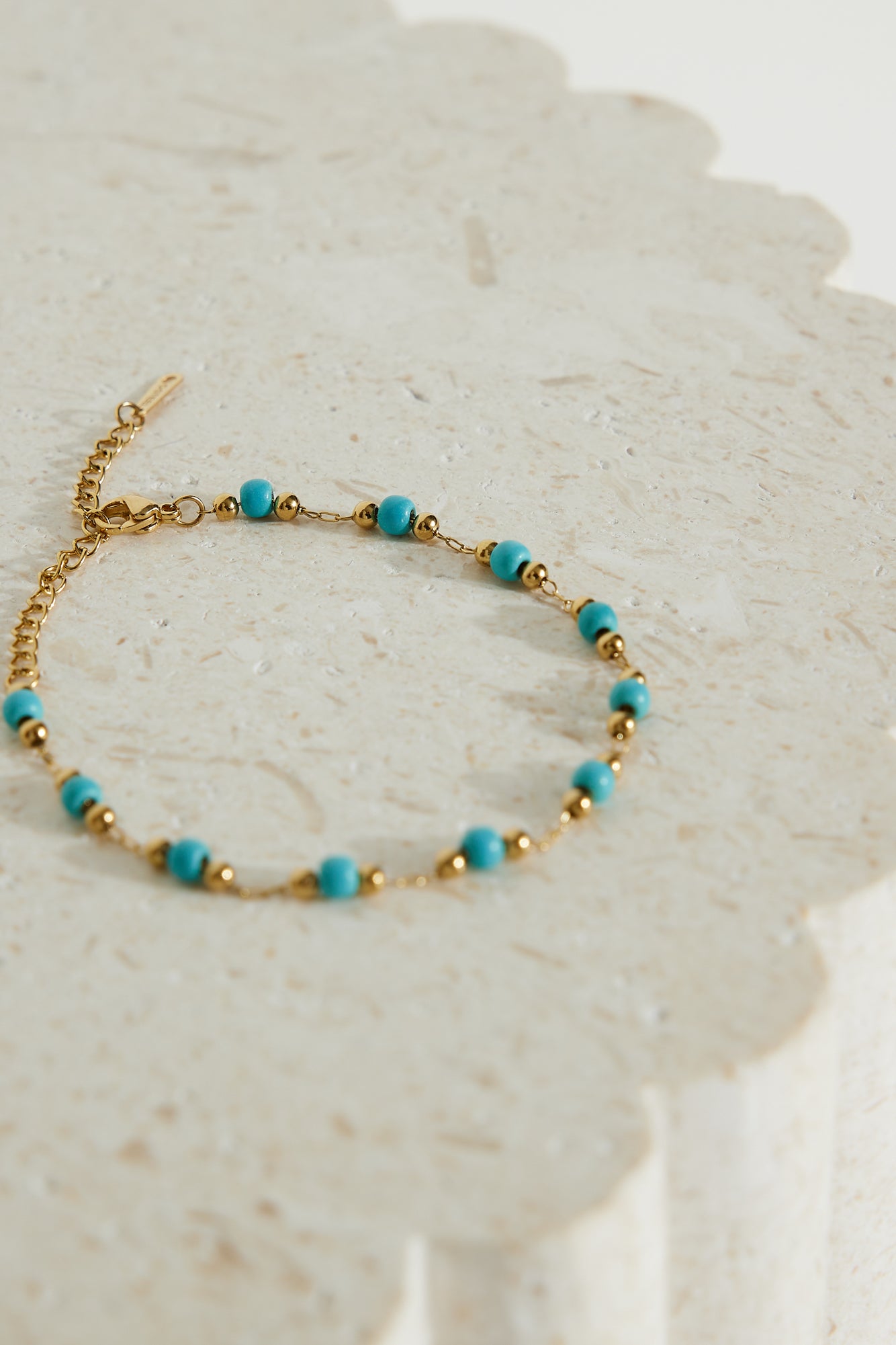 Women's blue and gold beaded bracelet