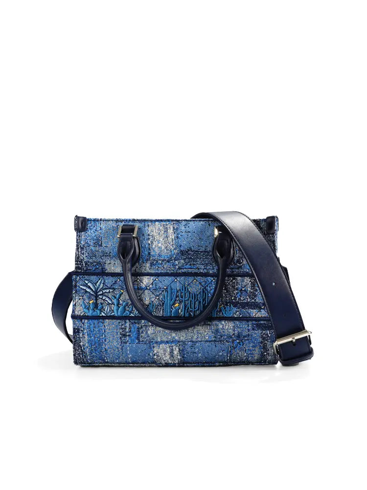 Women's blue structured stitch tote bag