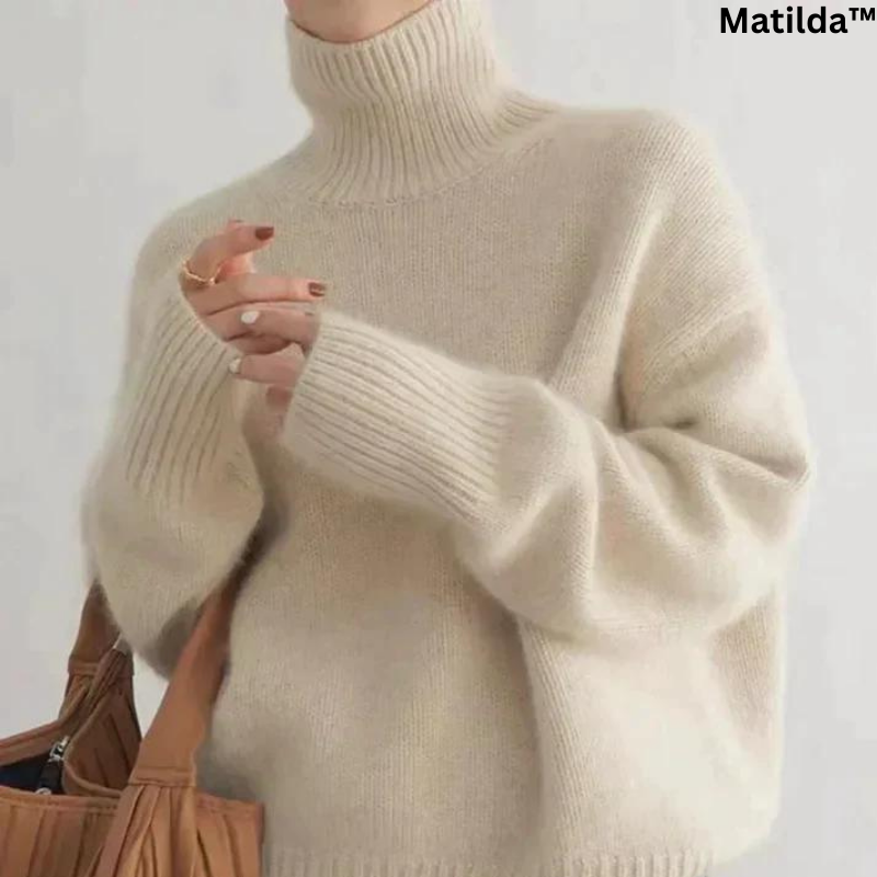 Women's cashmere turtleneck sweater detail