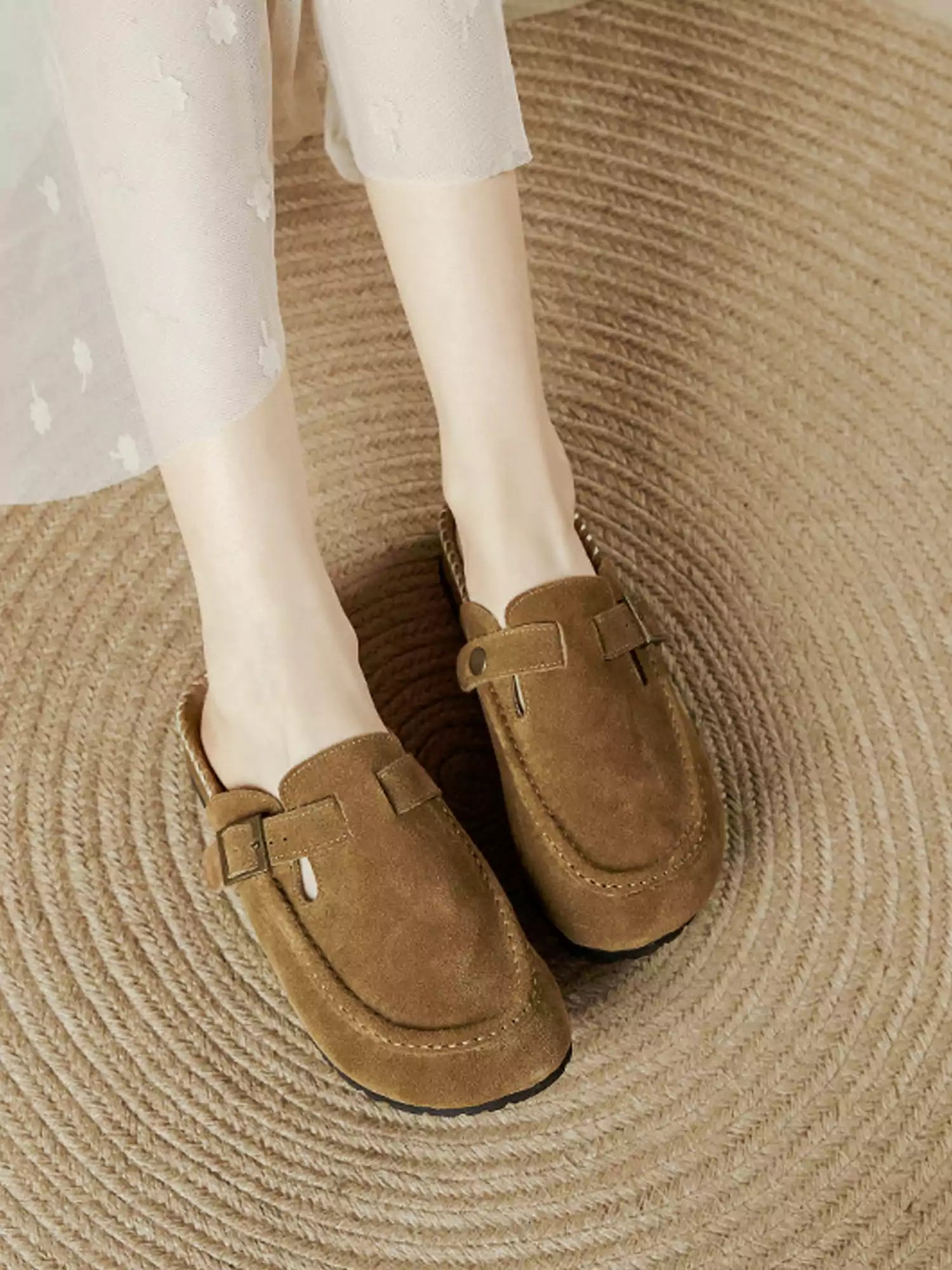 Women's cushioned closed-toe mules - worn on foot