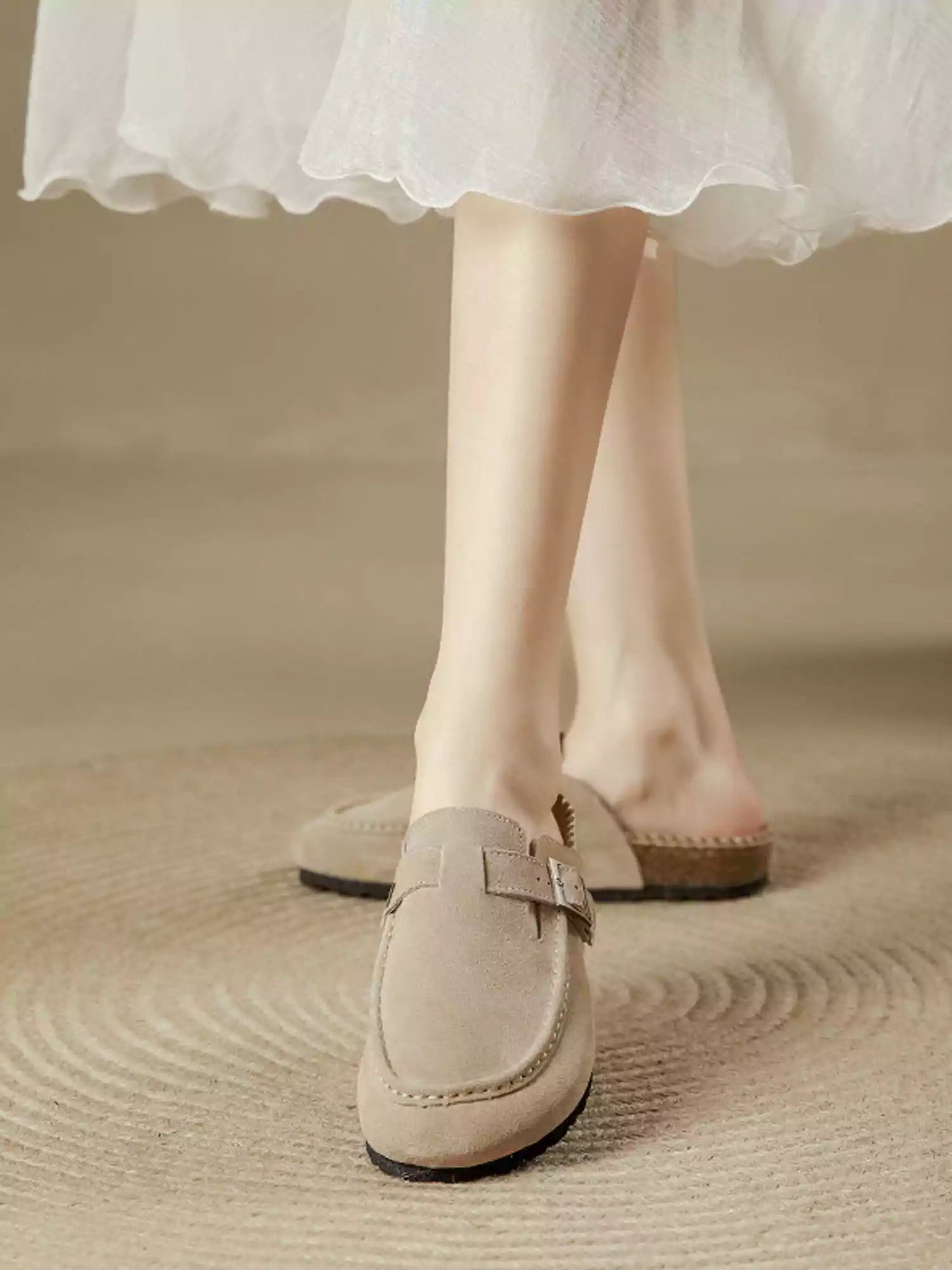 Women's cushioned closed-toe mules - back view
