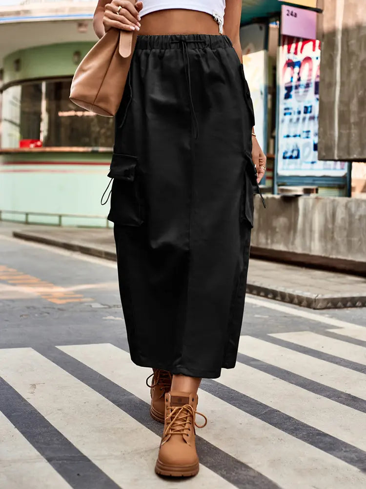 Women's denim cargo midi skirt with drawstring waist and pockets — back view