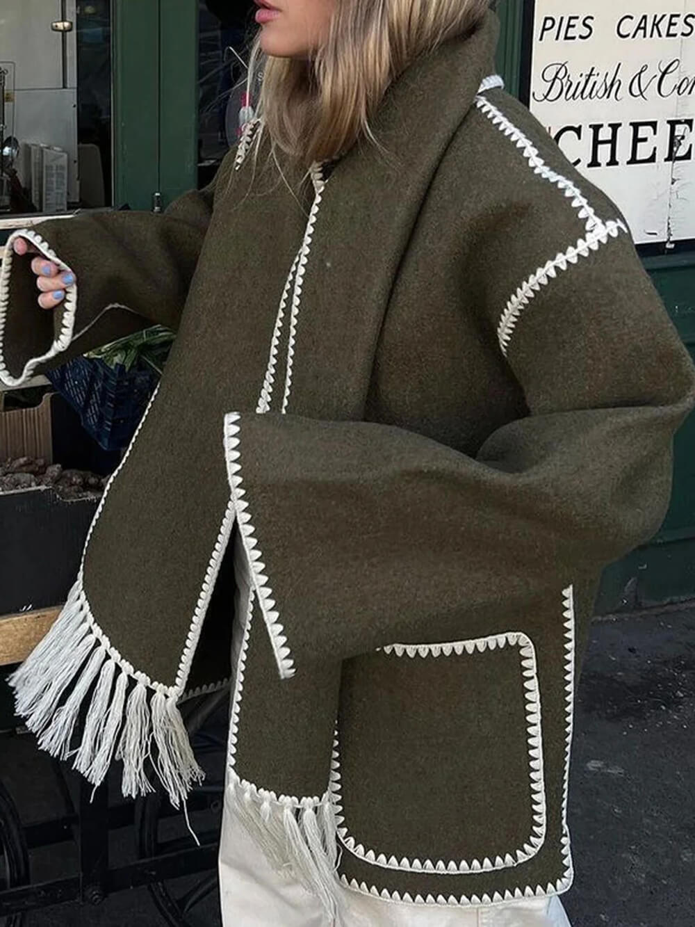 Women's draped fringed wrap jacket — styled detail