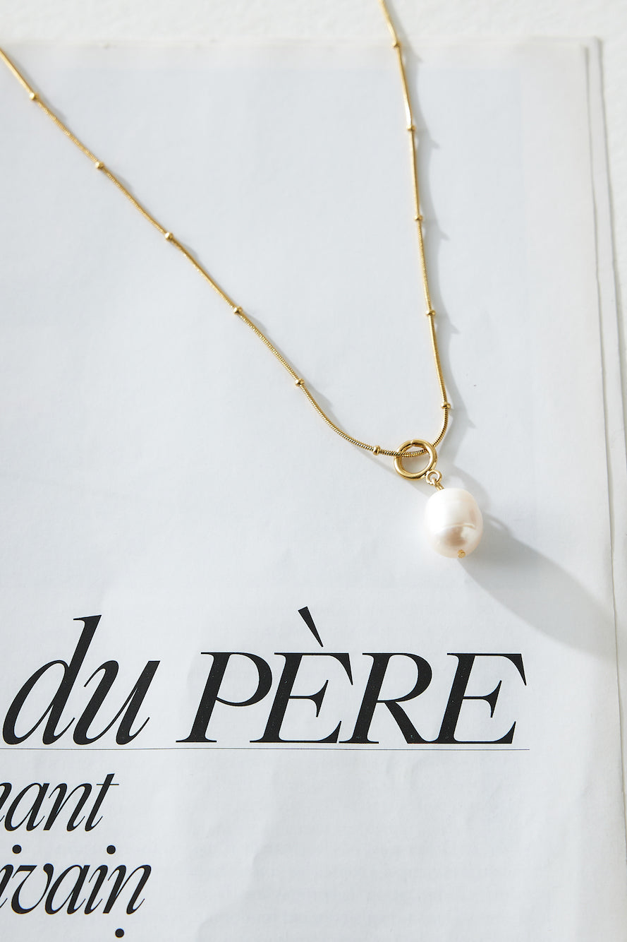 Women's gold chain pearl pendant necklace — alternate angle