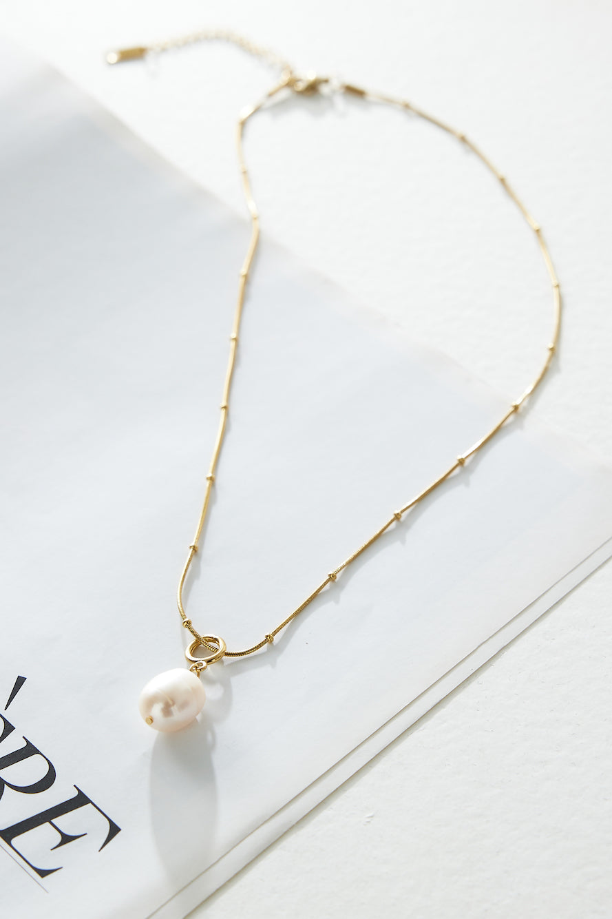 Women's gold chain pearl pendant necklace — alternate angle