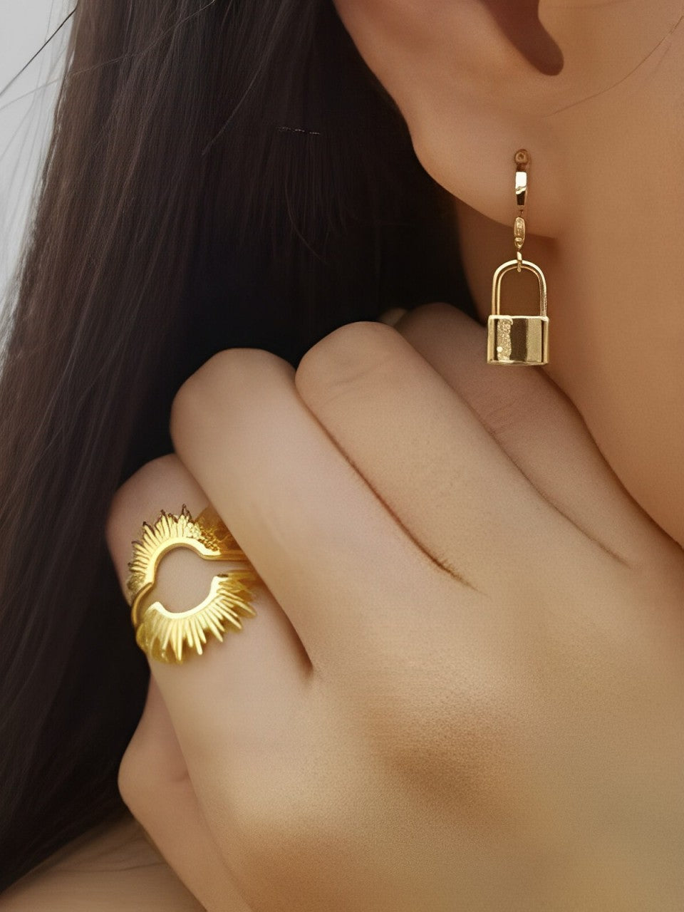 Women's gold-tone daisy sunflower ring — worn view