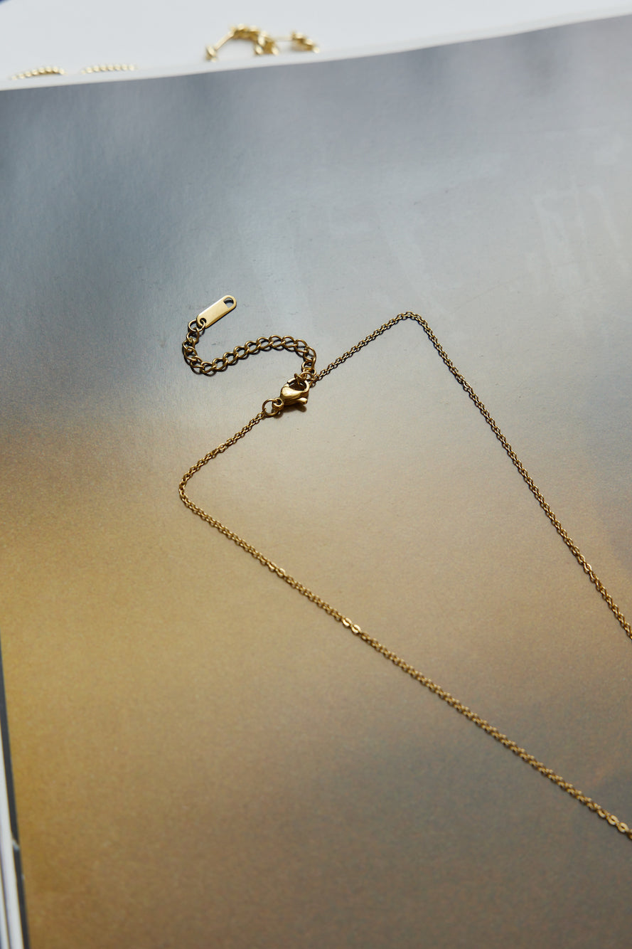 Women's gold delicate drop necklace — alternate angle