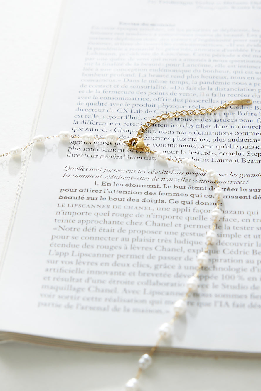 Women's gold freshwater pearl necklace — detail shot