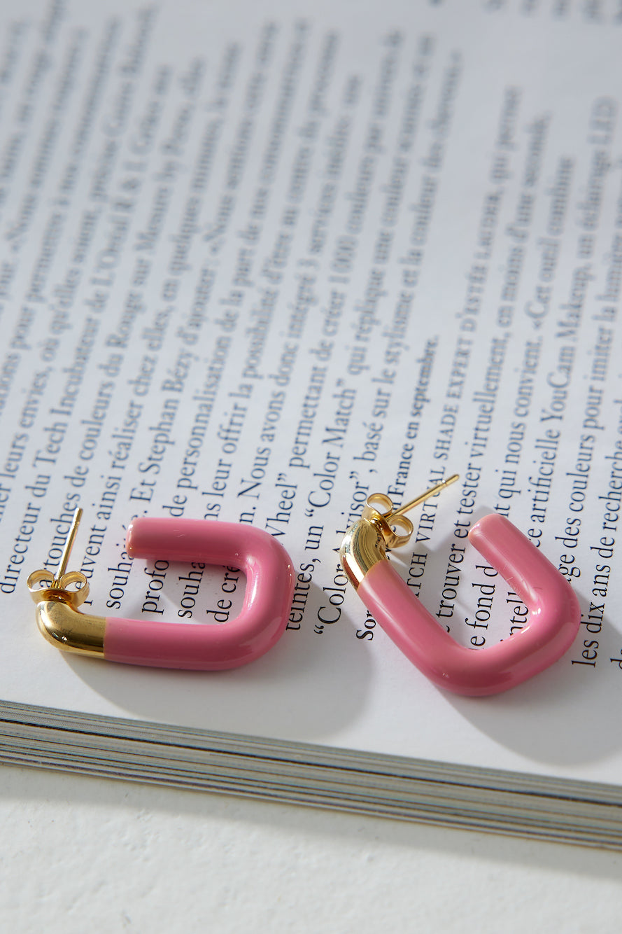Women's gold-plated pink hoop earrings — close-up detail