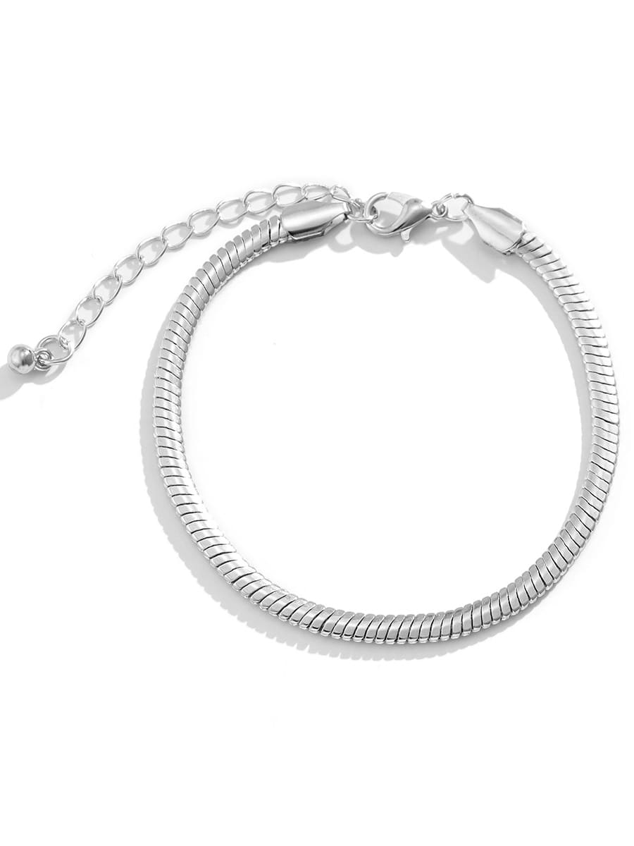 Women's gold flat snake-bone chain bracelet — detail view