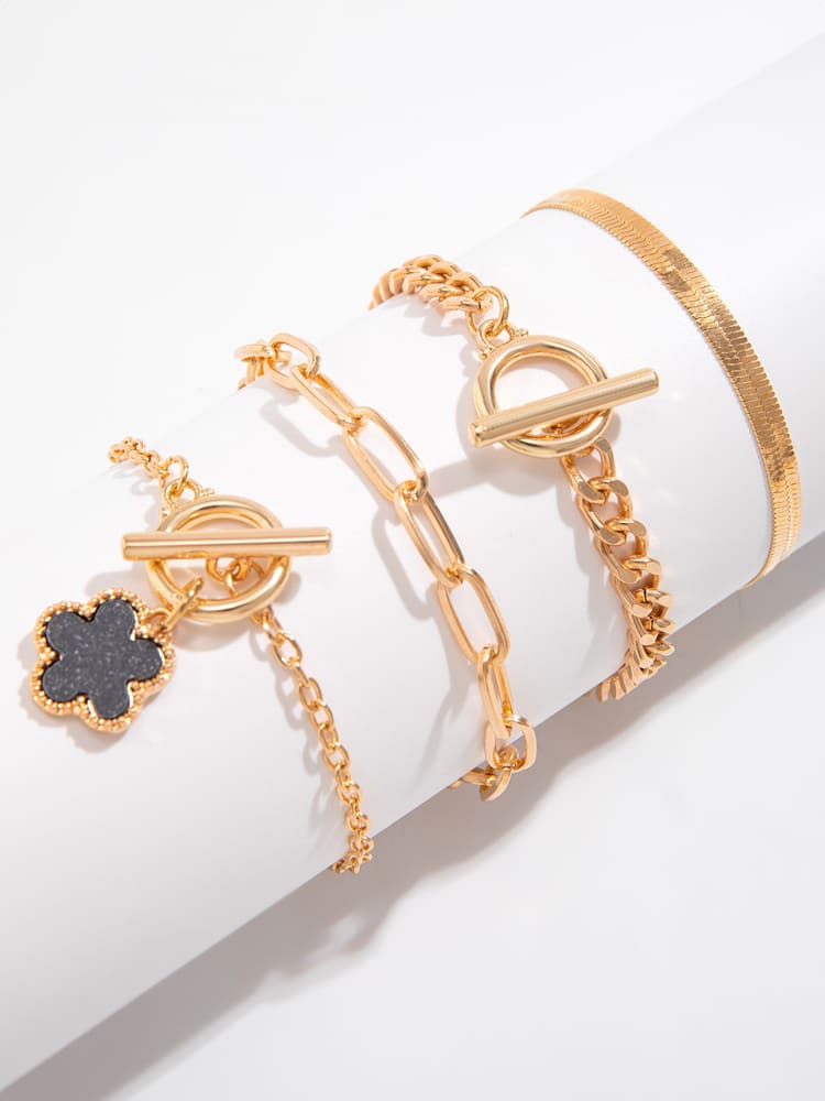 Women's gold snake chain clover charm bracelet — detail