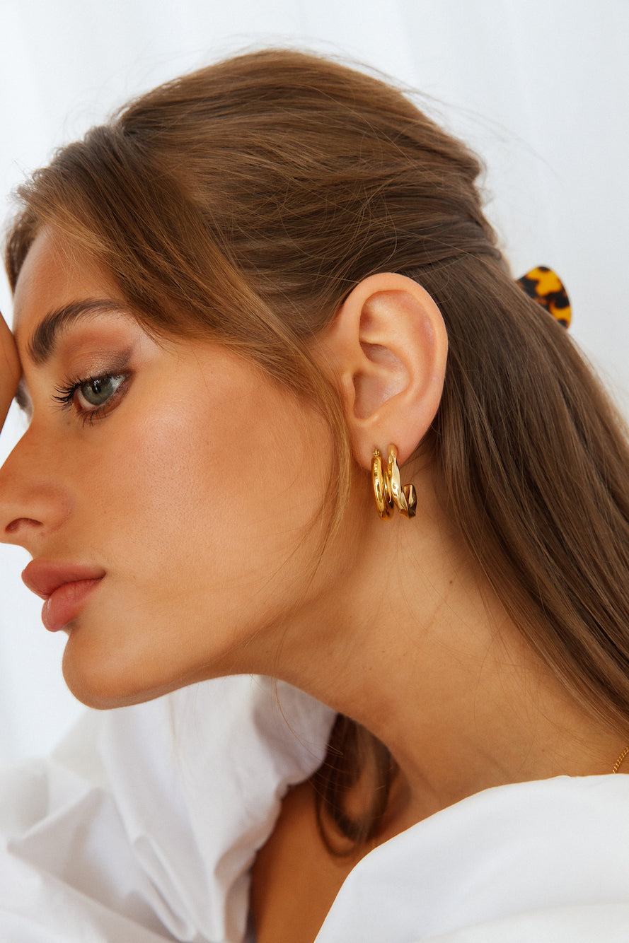 Women's gold staple hoop earrings