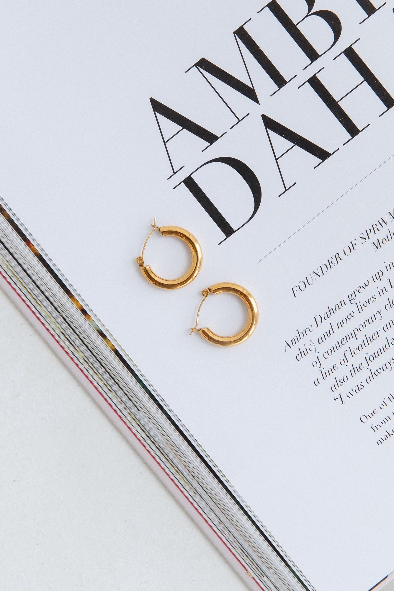 Women's gold staple hoop earrings