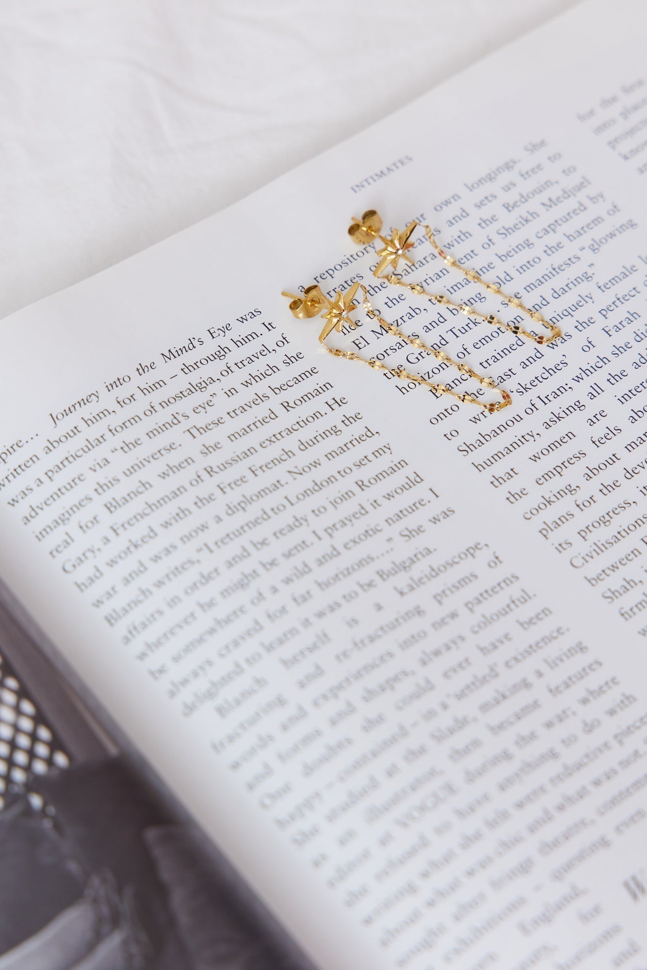 Women's gold star chain drop earrings — alternate angle