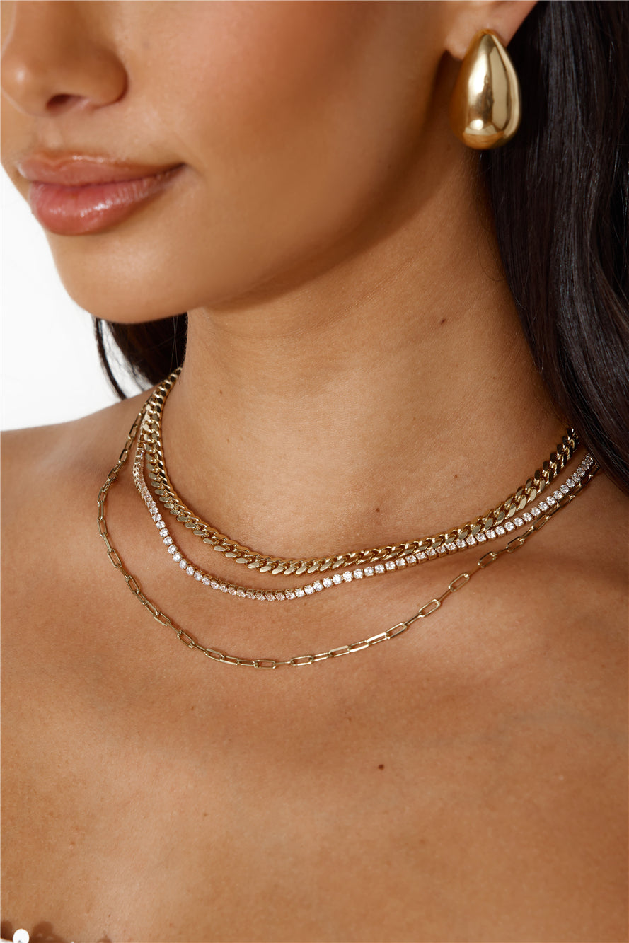 Women's gold triple chain necklace