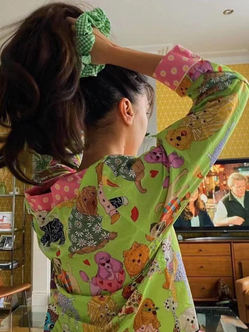 Women's green illustrated print pajama set — fabric detail