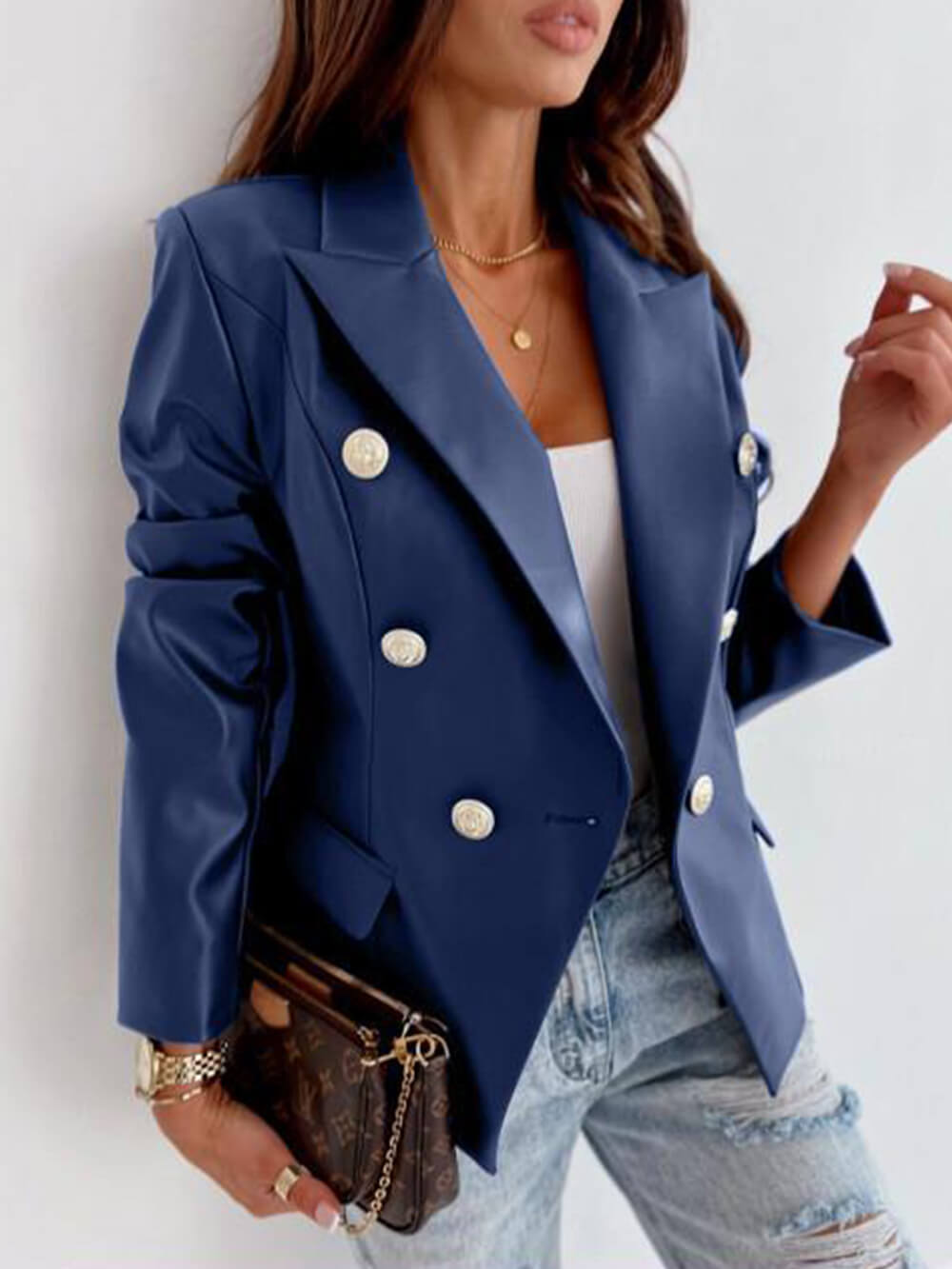 Women's double-breasted leather moto jacket with lapel collar