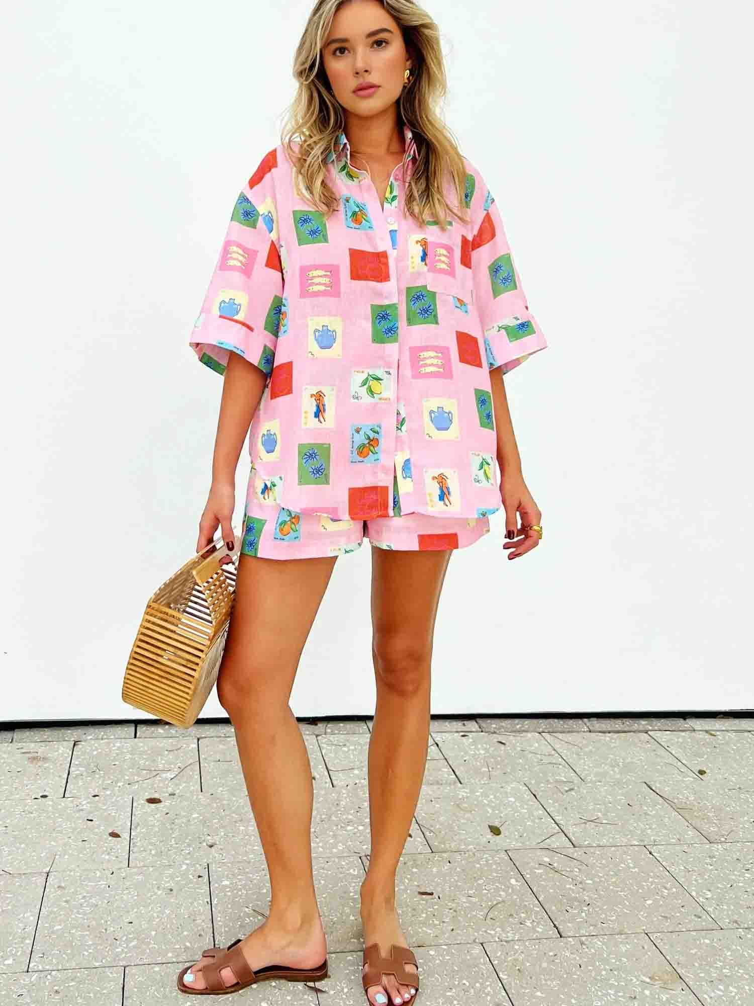 Women's pink stamp print short set — full length