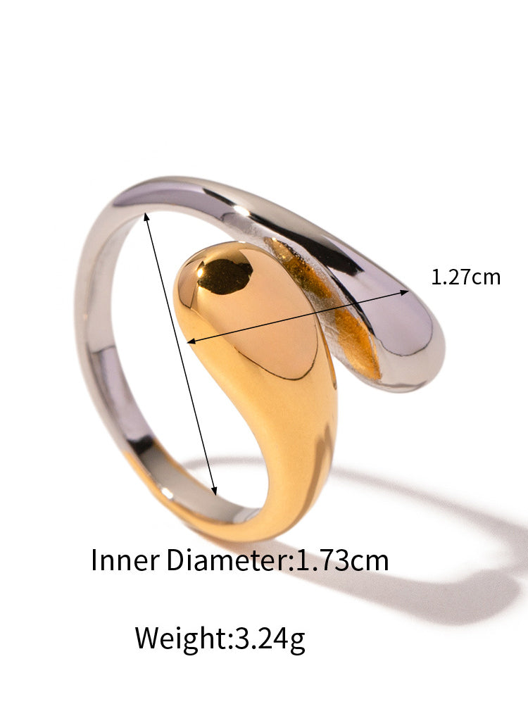 Women's two-tone gold and silver droplet ring — worn