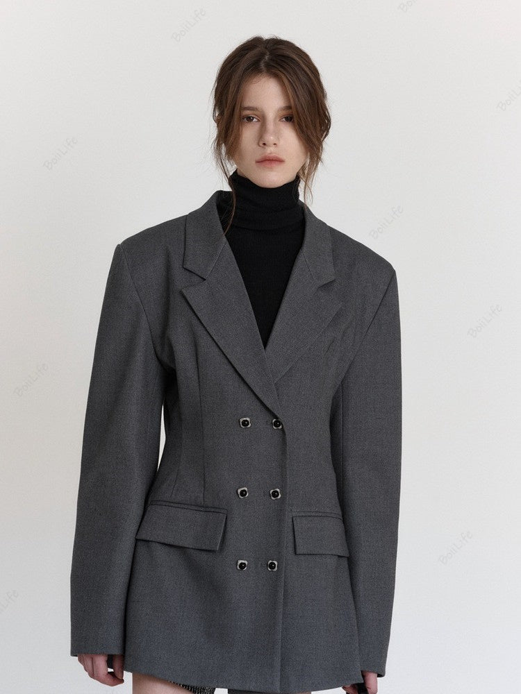 Women's waist-cinched wool blazer, styled outfit