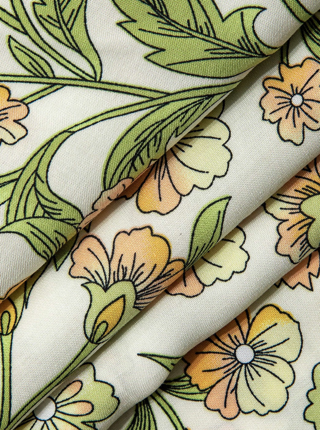 Women's yellow floral print high-waist wide-leg trousers — detail view