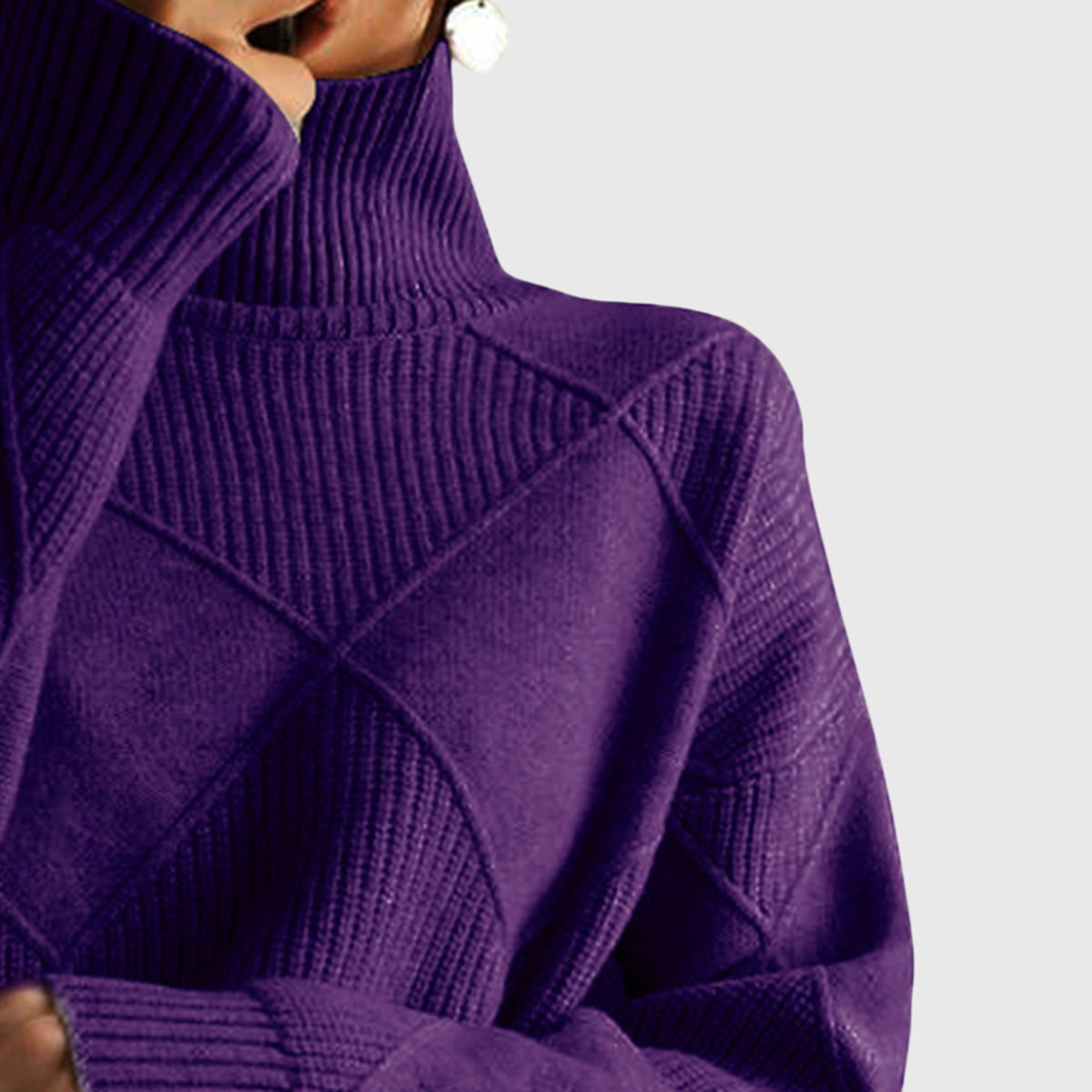 Iris purple turtleneck sweater with textured geometric knit pattern and long sleeves.