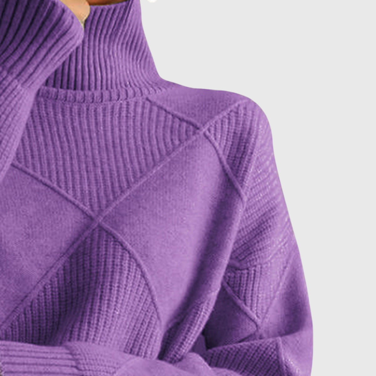 Iris purple turtleneck sweater with textured diamond knit pattern and ribbed collar and cuffs.