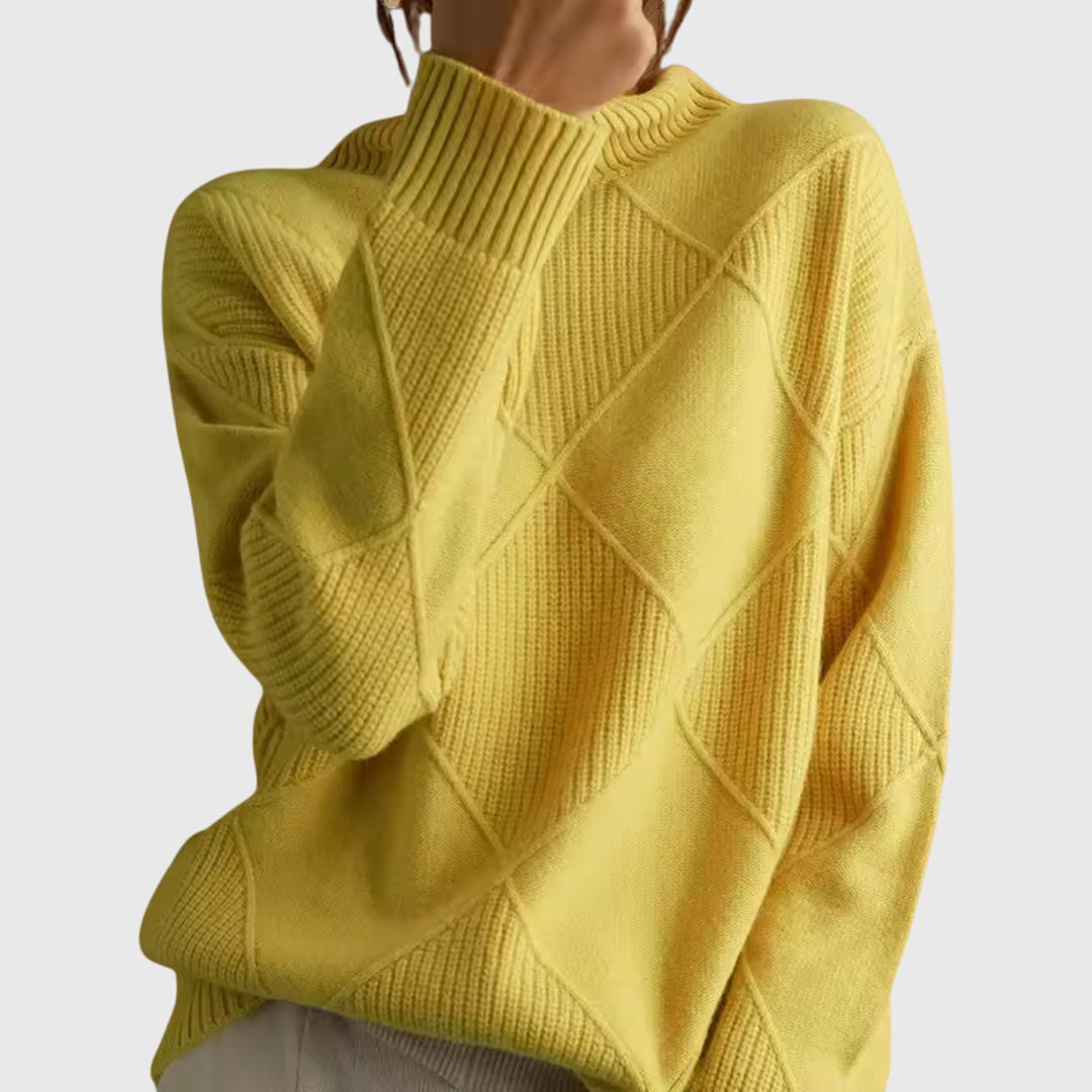 Yellow turtleneck sweater with ribbed diamond pattern and long sleeves.