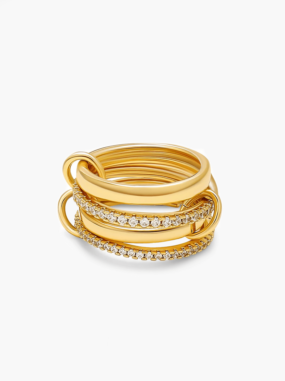 Set of gold rings with diamond accents on a white background