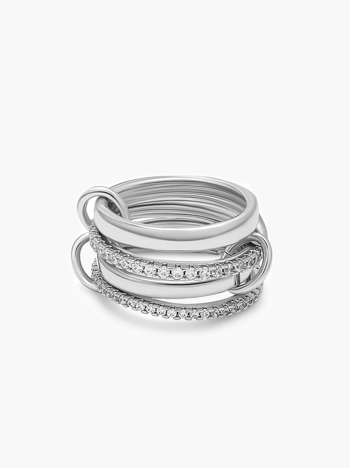 Set of silver rings with embedded stones on a white background