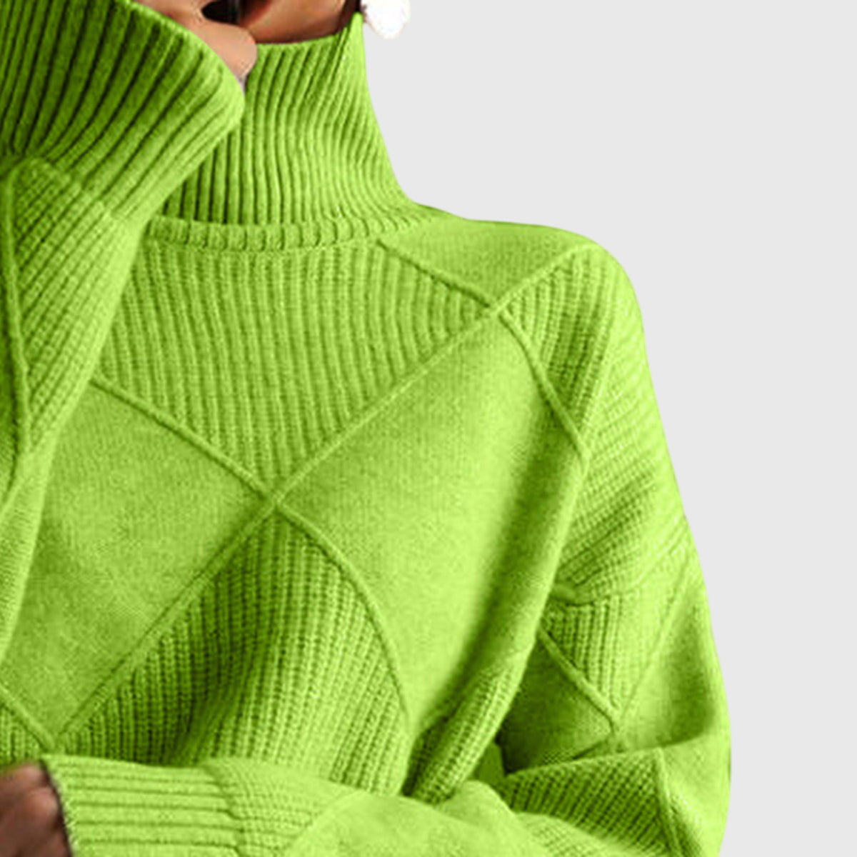 Bright green turtleneck sweater with ribbed, textured geometric knit pattern and long sleeves.