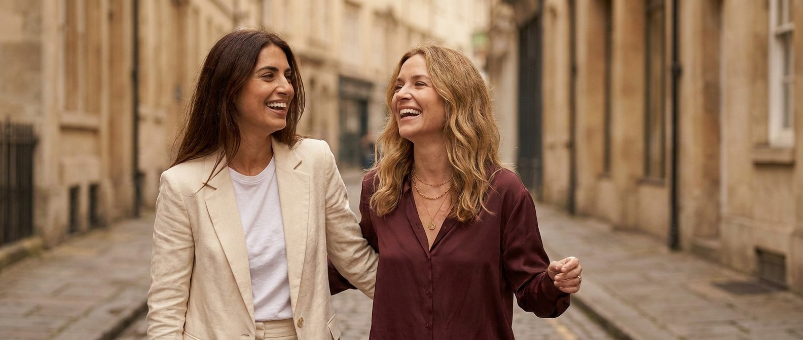 Olivia and Sophia, founders of Emyri, walking through a European street