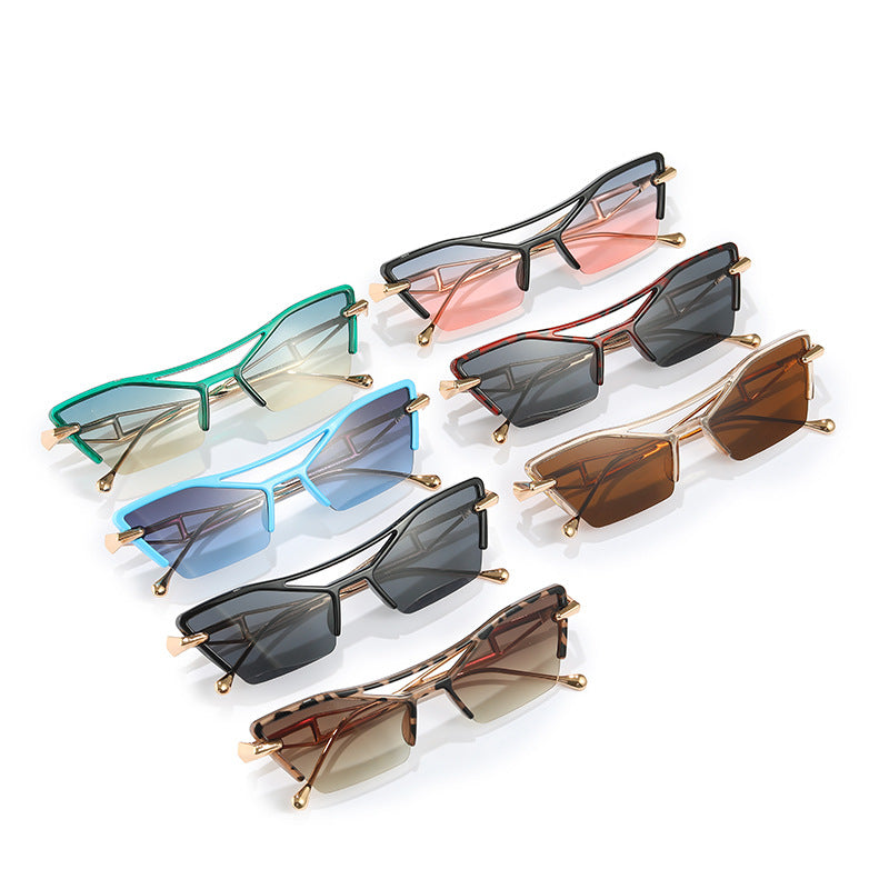 Sculpted Cat Eye Sunglasses — women's sunglasses, view 14 by Emyri