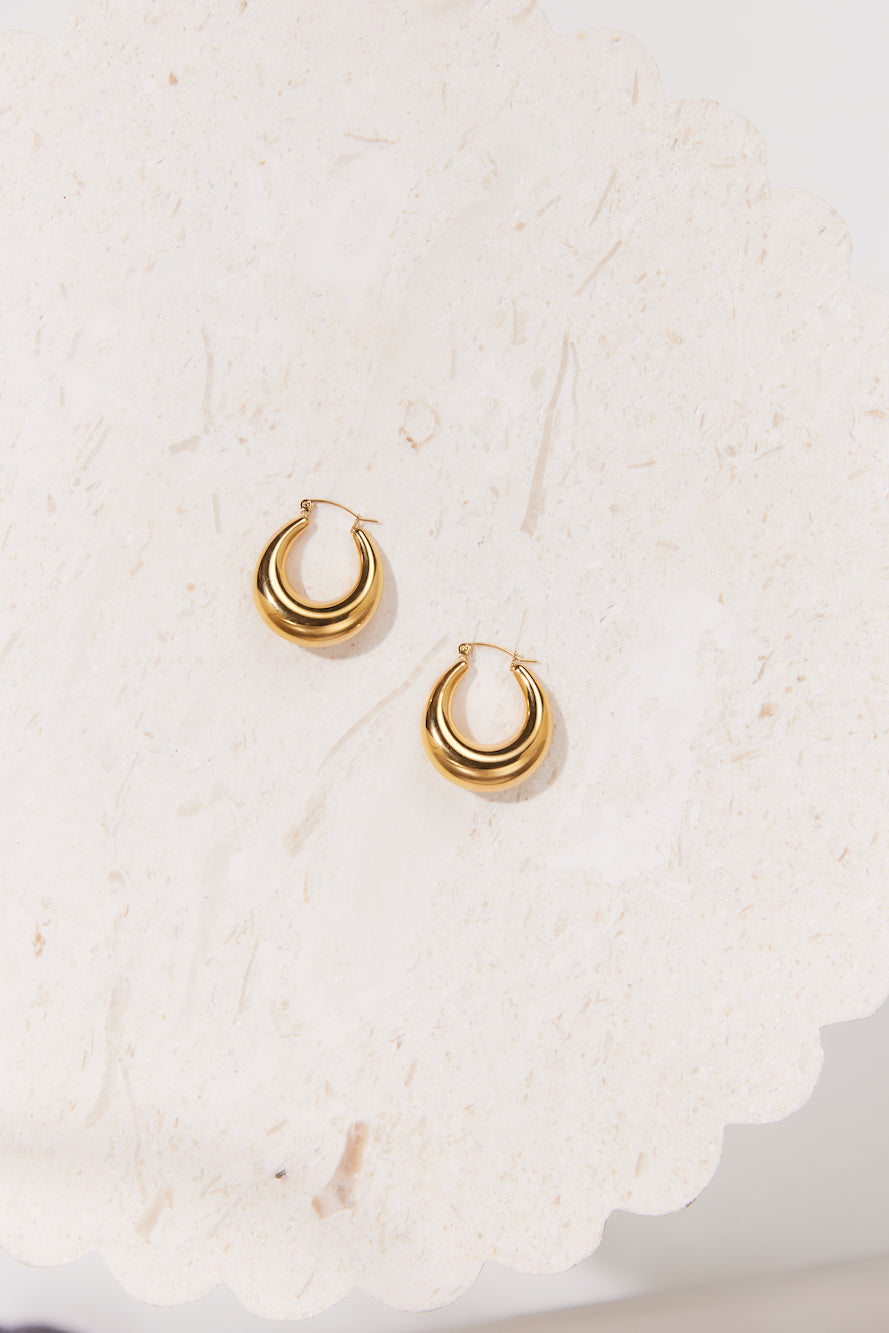 Women's sleek gold hoop earrings