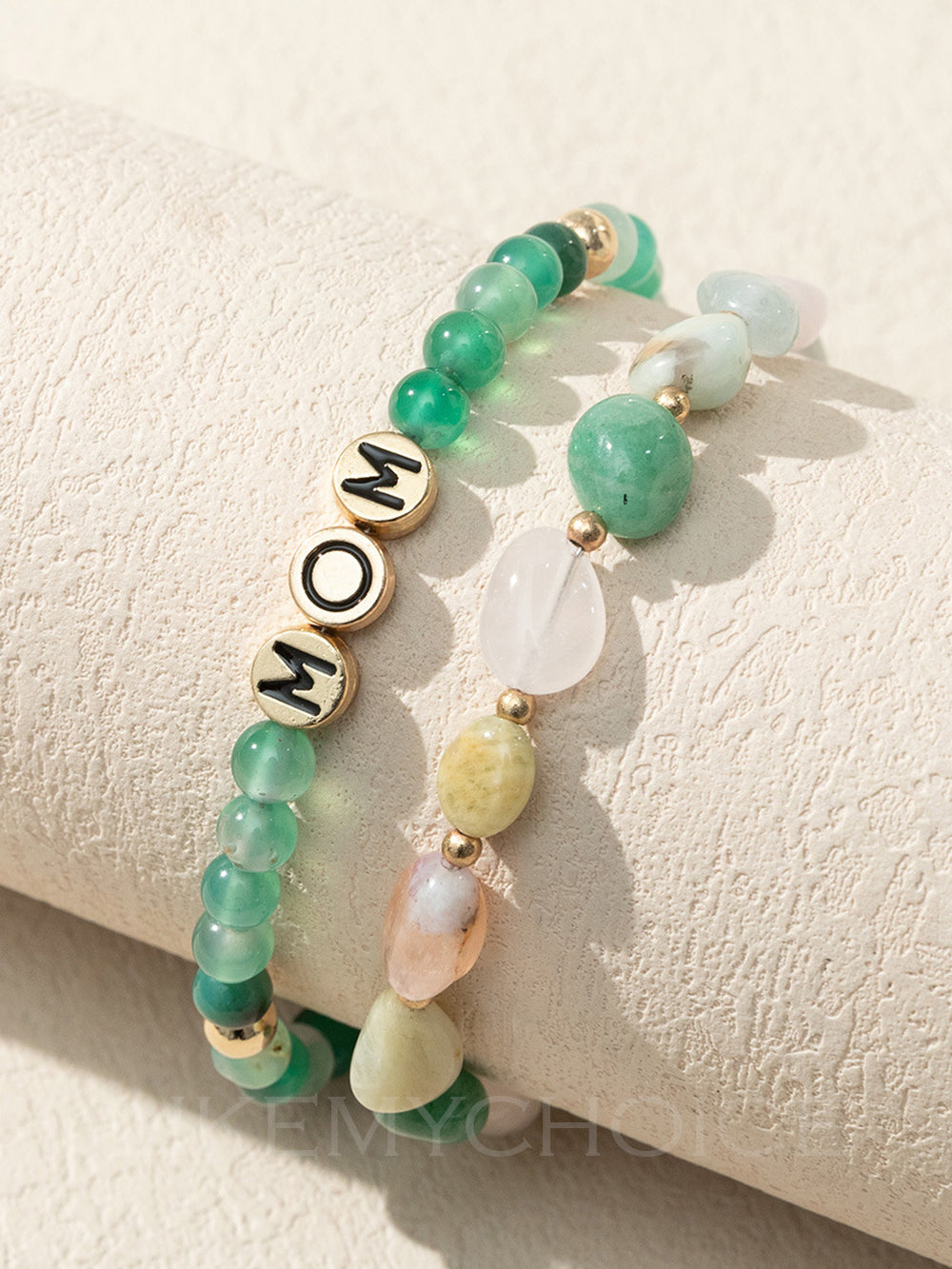Women's green agate beaded heart charm bracelet — worn