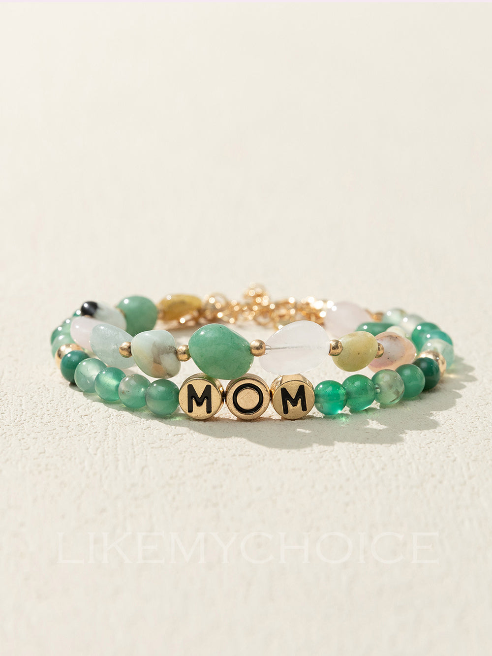 Women's green agate beaded heart charm bracelet — detail view