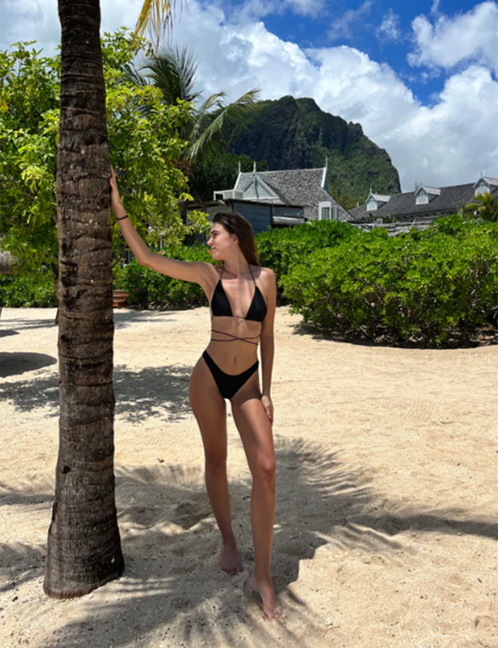 Women's black back-tie triangle bikini set — styled look
