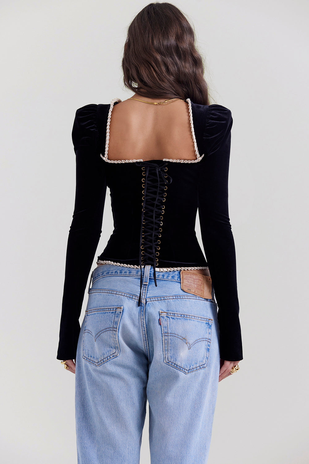 Women's black boned velvet corset — styled view